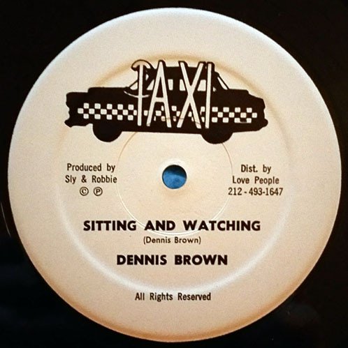 Dennis Brown — Sitting And Watching
